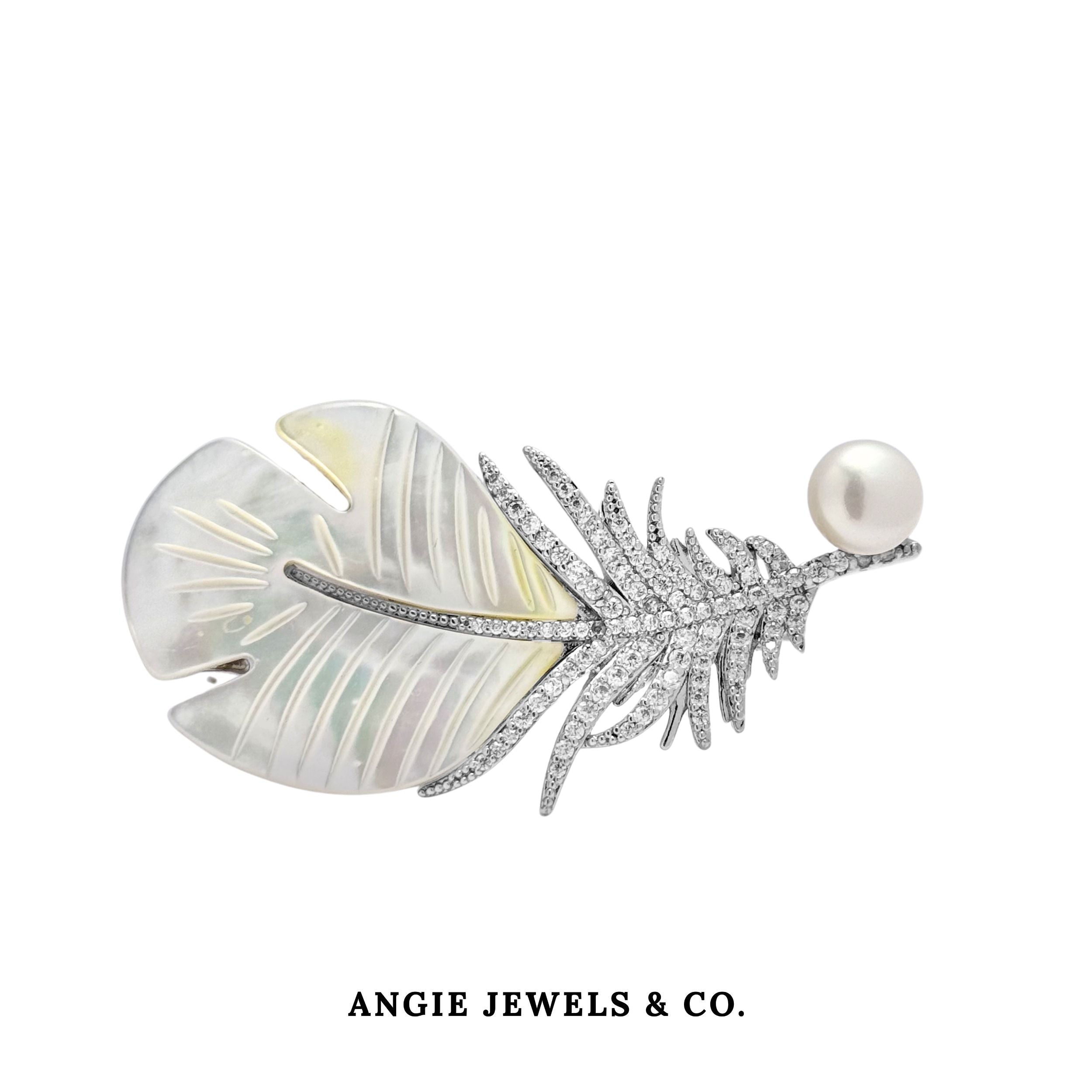 Enchanted Shell Quill Brooch