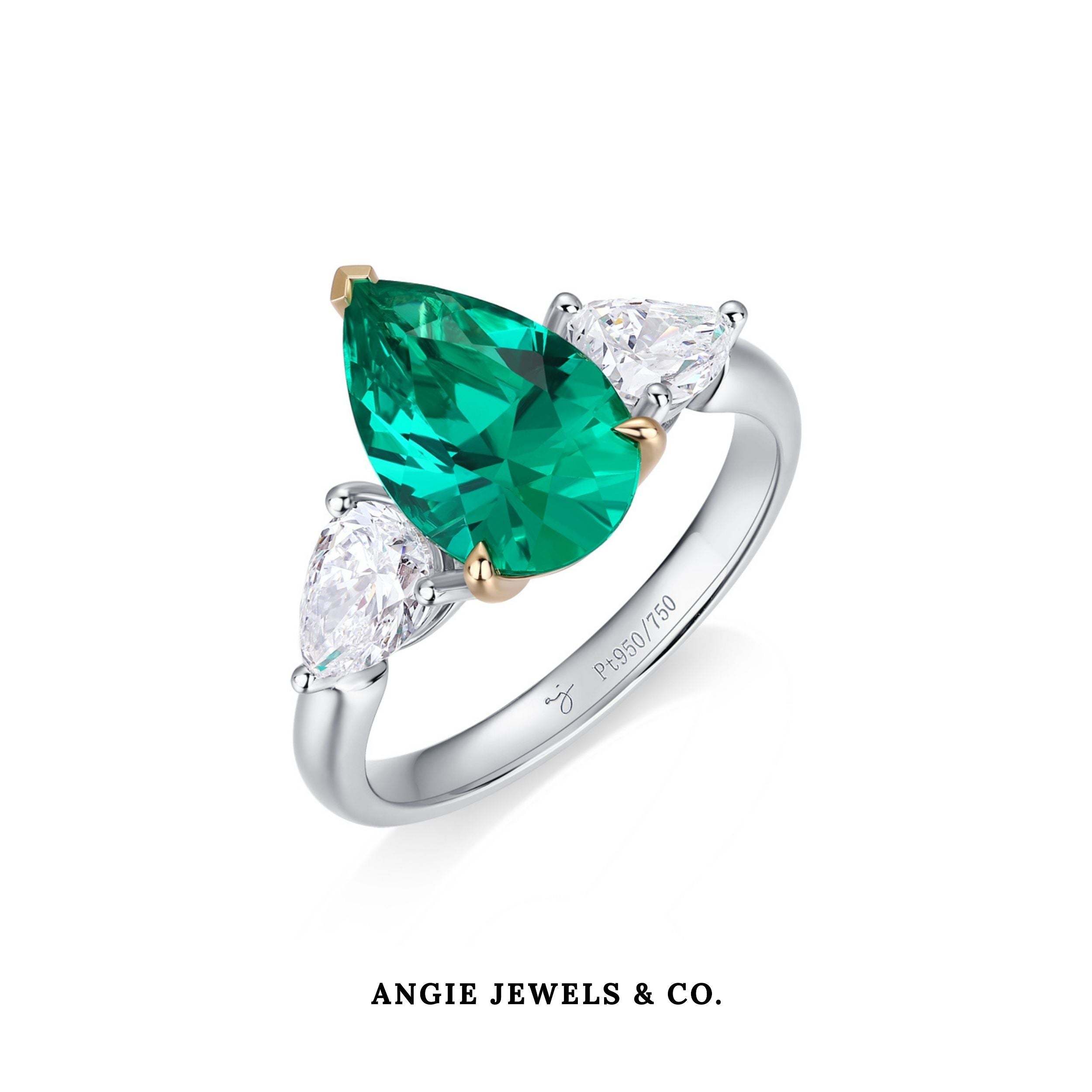 Pear Shape Emerald Three-Stone Ring