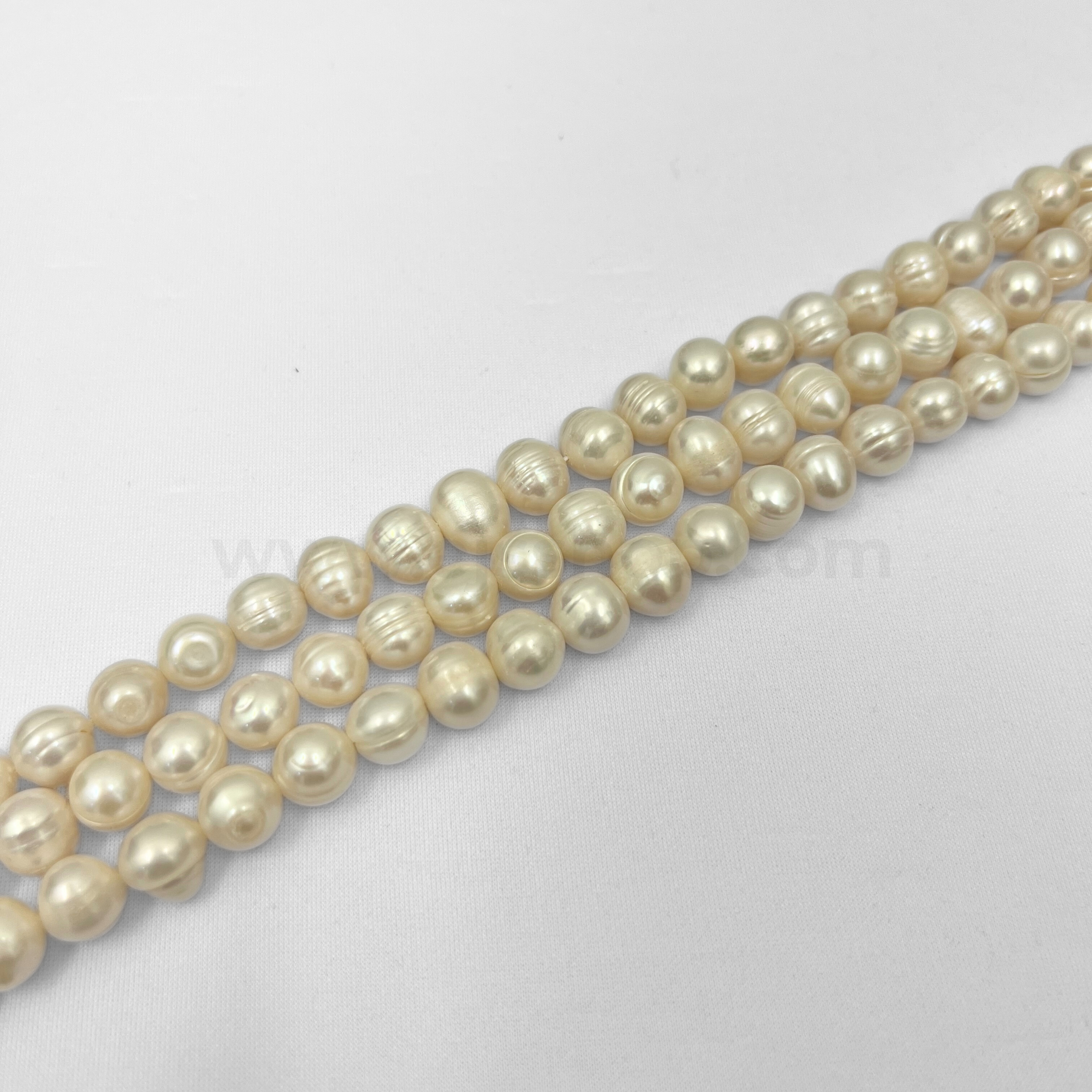White Round 11mm - 12mm Freshwater Pearls