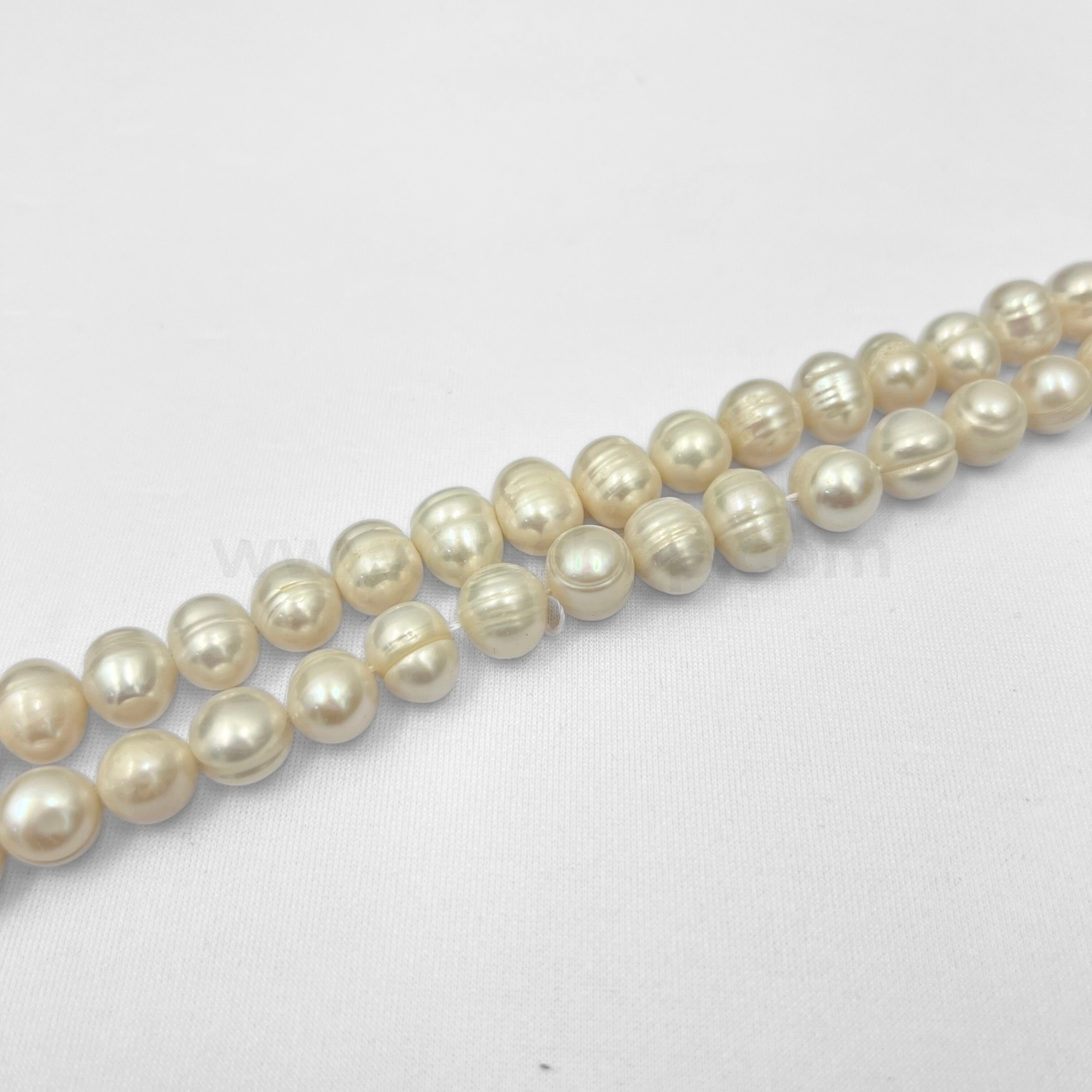 White Round 10mm - 11mm Freshwater Pearls