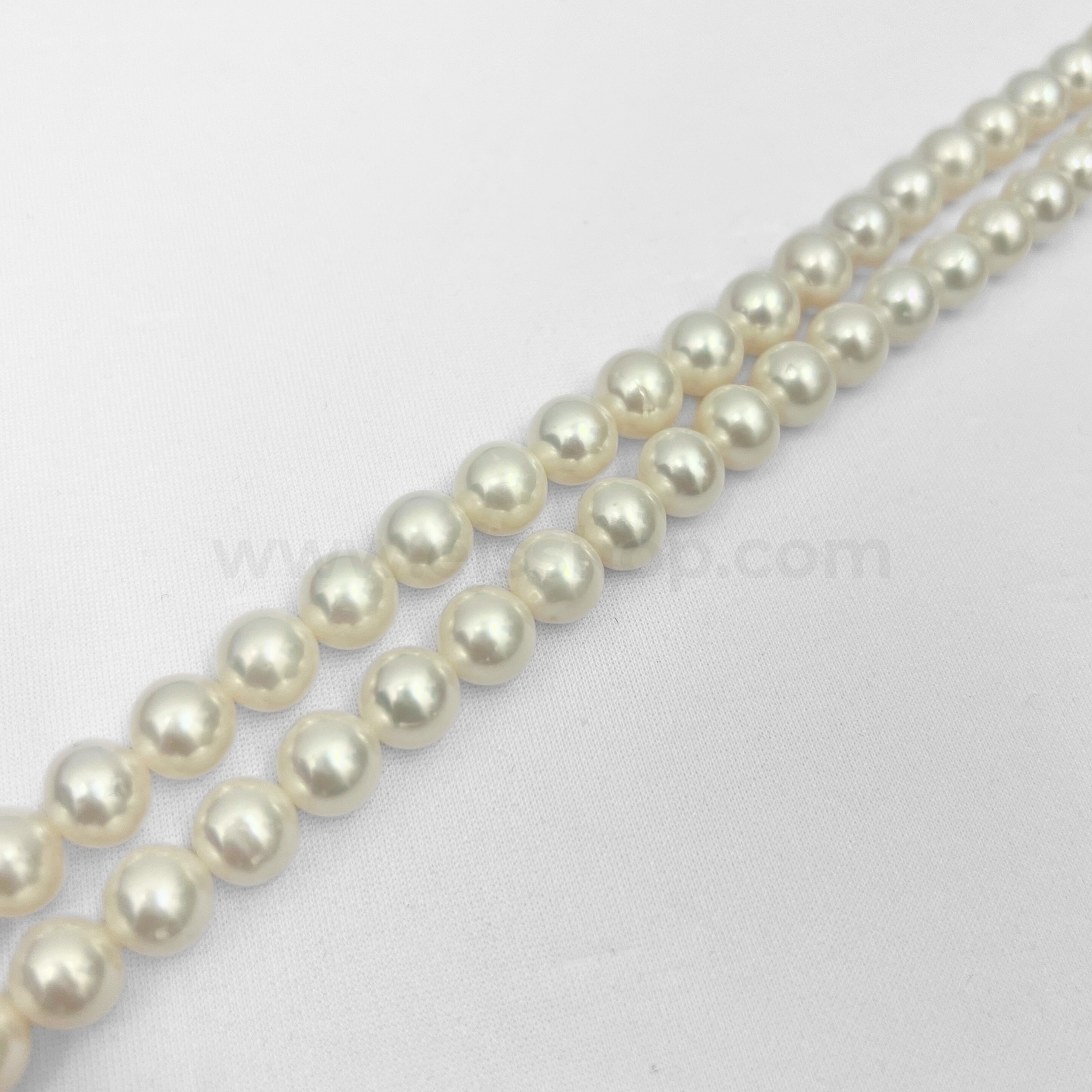 White Round 10mm - 11mm Grade AA Freshwater Pearls Near Full Round