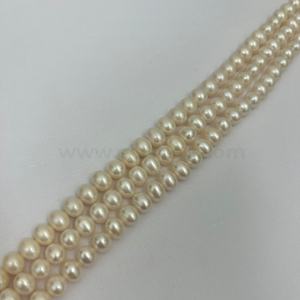 White Round 9mm - 10mm Grade AA Freshwater Pearls - 580
